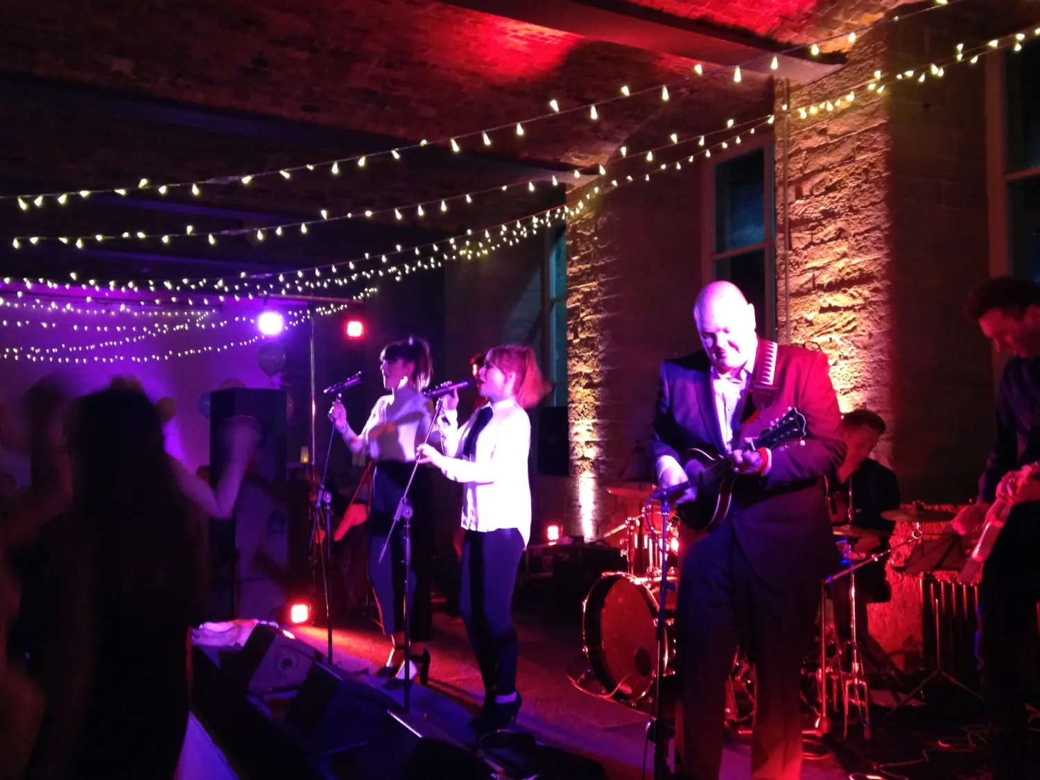 The Psycho Slinkys playing live on stage at The Arches